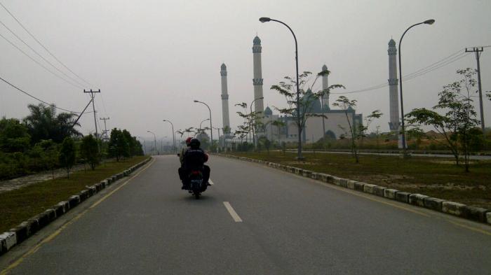 Pangkalan Kerinci Diguyur Hujan, Kabut Asap Mulai Menipis